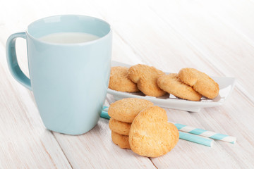 Cup of milk and heart shaped cookies