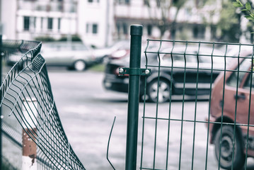 Wire fence at guarded parking broke by thief