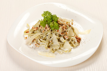 pasta with cream cheese and cedar nuts