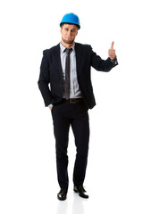 Happy smiling businessman with thumbs up.