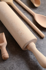 Set of wooden kitchen utensils on a table