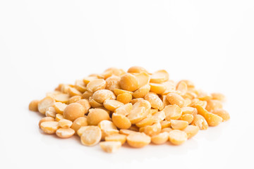 Yellow split peas isolated on white background