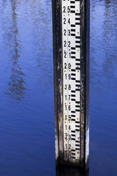 Water level measurement gauge during flood.
