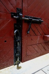 Black Bolts on a Brown Door