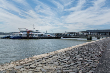 Fototapeta premium Boat in Tejo river in Lisbon.