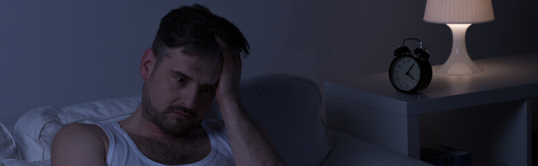 Man with sleeplessness