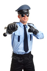 Policeman in sunglasses shows on you with nightstick