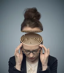 Foto op Aluminium Conceptual image of a maze in the woman's brain © konradbak