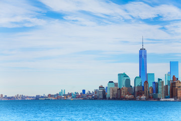 Fototapeta premium New York skyscrapers view from waters of harbor