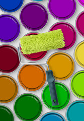 Paint roller on paint tins