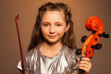 Close-up view of smiling girl with cello isolated © Sergey Novikov