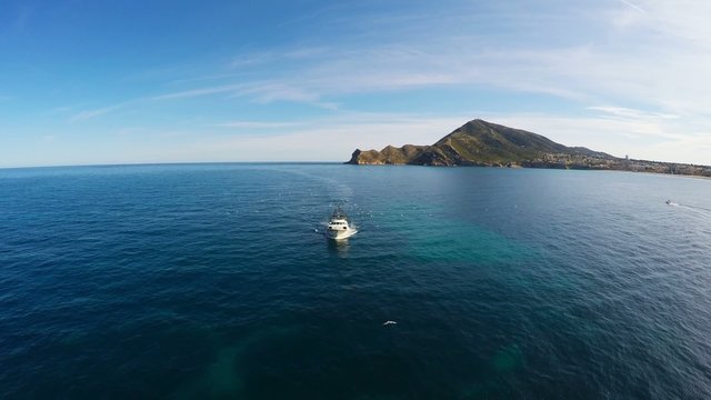 A commercial fishing boat entering harbor