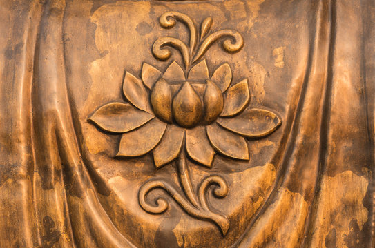 Lotus on golden bronze