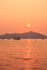 Sunset and sailboat