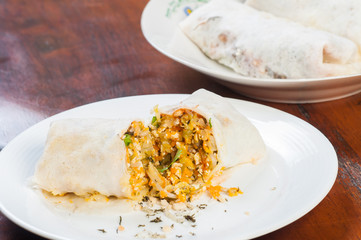 fresh made lumpia or mixed vegetable on a rice wrap