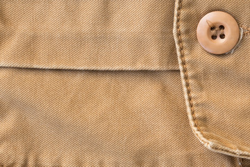 front pocket on brown shirt textile texture background