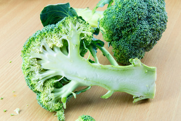 fresh broccoli on wood board