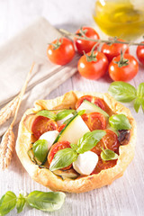 tomato quiche with zucchini and mozzarella