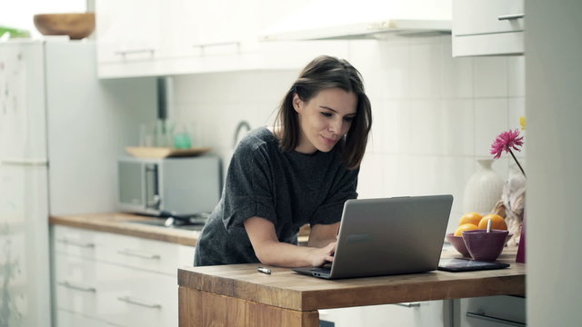 Young businesswoman working on laptop 