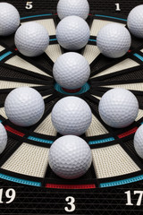 Detail dartboard with golf balls