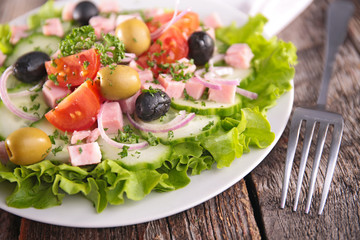 salad with cucumber,ham and tomato