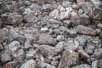 Dark gray granite stones, background texture