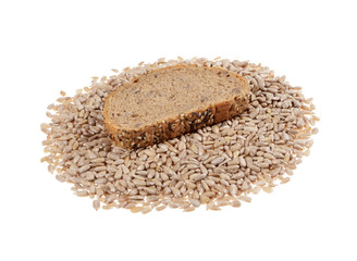 Slices whole grain bread on raw sunflower seeds