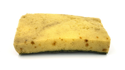 Old kitchen sponge on white background.