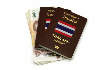 Obraz premium Thailand passport and Thai money for Travel or A.E.C. concept