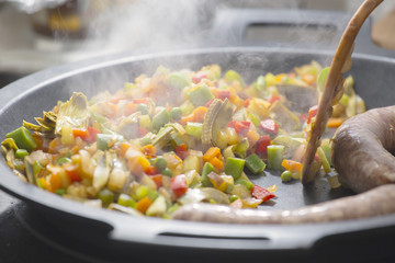 Cooking Spanish veggies paella