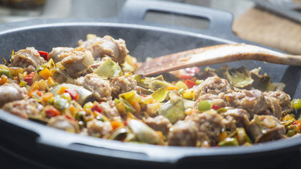 Cooking Spanish veggies paella