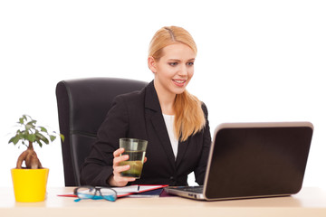 Young businesswoman in her office