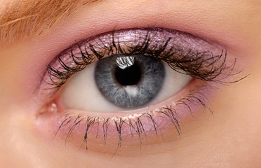 Macro image of human eye with make-up
