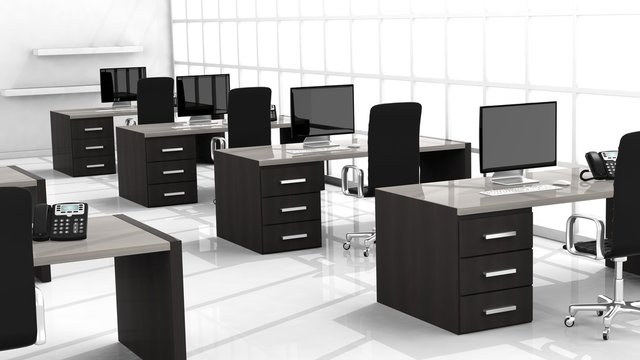 Interior of a modern office with multiple working spaces
