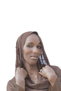 African woman wearing a traditional headscarf, isolated 