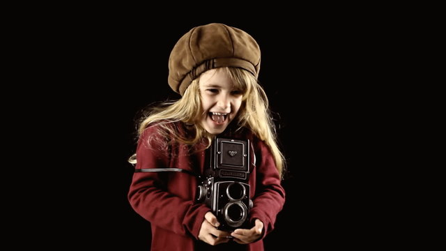 Little girl vintage paparazzi photographer