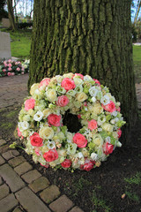Sympathy wreath near tree