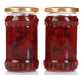 Jars of strawberry jam isolated on white