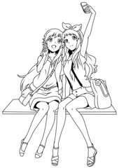 two fashion girls taking a selfie