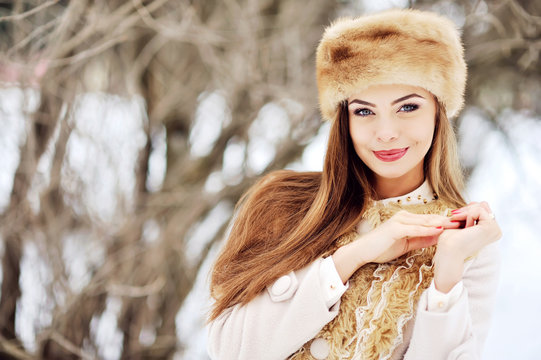 Beautiful portrait of young woman in winter