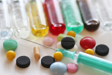 background medicine pill vials syringes