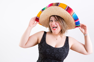 Happy Lady with Mexican Sombrero Looking at Camera