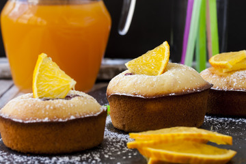 Muffins with berries and oranges