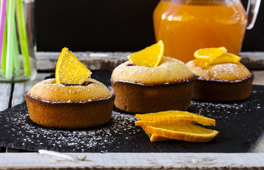 Muffins with berries and oranges