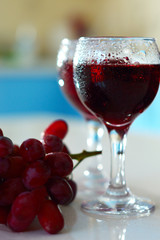 glasses of wine and grapes