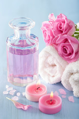 Obraz na płótnie Canvas spa aromatherapy with rose flowers perfume and herbal salt