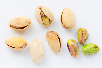 Isolated pistachios close up on a white