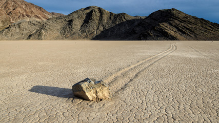 Sliding Stones On Dry Lakebed in desert Racetrack Playa, Death Valley National Park, California