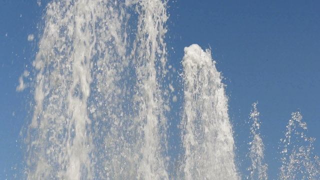 Slow motion fountain. Water splash in slow motion.
