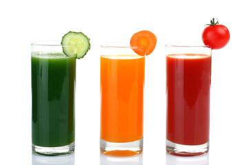 Fresh vegetable juices isolated on white
